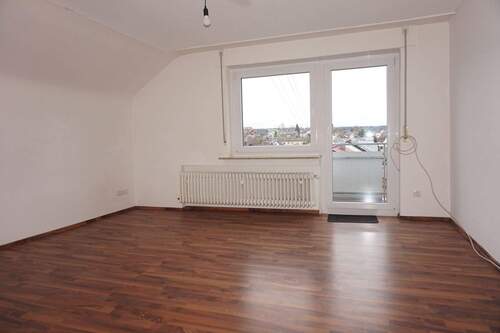 Wohnzimmer - 3 Zimmer Dachgeschosswohnung in ruhiger Wohnlage von Aichhalden!