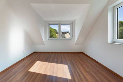 Schlafzimmer - Bezugsfertige Dachgeschosswohnung im Herzen des Martinsviertels mit Tiefgaragenstellplatz