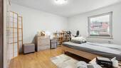 1. OG Schlafzimmer 1 - 