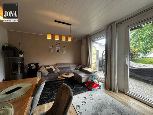 Wohnzimmer - Reihenendhaus mit 93,00 m² in Heinersreuth zum Kaufen