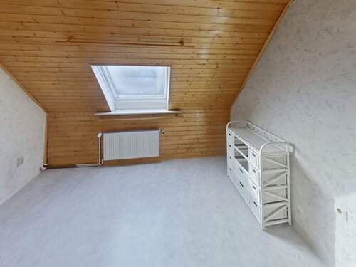 Schlafzimmer im Dachgeschoss - 