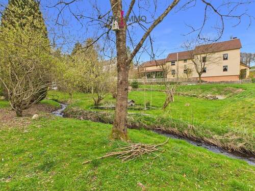 Bild 1 - Liebevoll gepflegtes Einfamilienhaus mit idyllischem Garten und romantischem Bachlauf