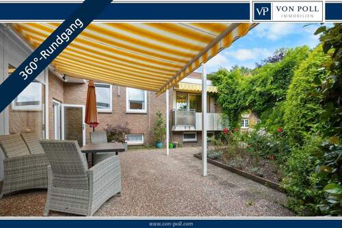 Titelbild - Flachdach-Einfamilienhaus (Split-Level) mit vermieteter Gewerbeeinheit in Schortens-Grafschaft