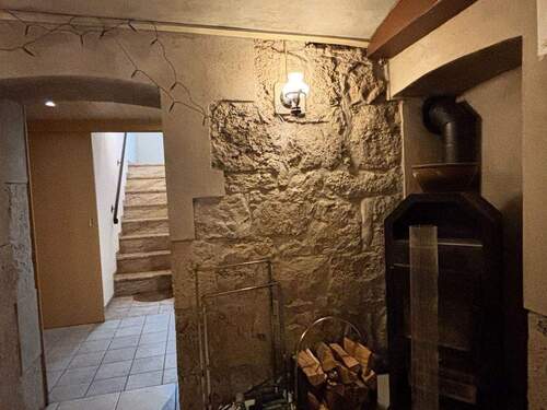 Raum für Freizeitaktivitäten mit Kaminofen - 