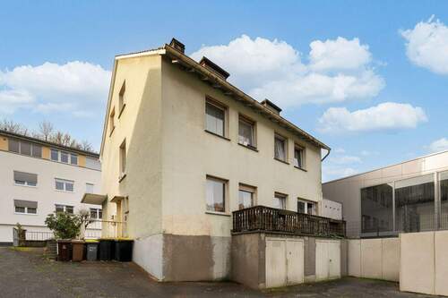 Ansicht Rückseite - 9 Zimmer Mehrfamilienhaus, Wohnhaus zum Kaufen in Wissen