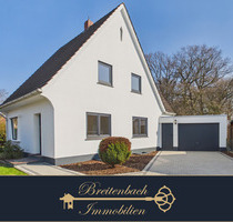 Langwedel-Daverden . Modernisiertes Einfamilienhaus mit Garage & grünem Garten
