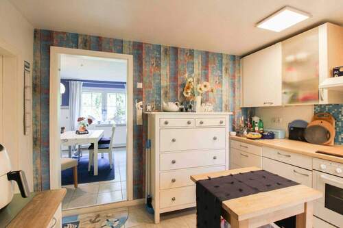 Küche und Esszimmer - Einfamilienhaus mit 98,70 m&sup2; in Wesselburenerkoog zum Kaufen