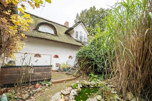 Innenhof mit Terrasse - 7 Zimmer Mehrfamilienhaus, Wohnhaus zum Kaufen in Kutenholz
