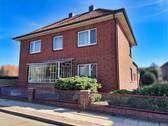 Straßenansicht - 6 Zimmer Mehrfamilienhaus, Wohnhaus zum Kaufen in Scheeßel