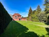 Gartenansicht - Mehrfamilienhaus, Wohnhaus mit 160,00 m&sup2; in Scheeßel zum Kaufen