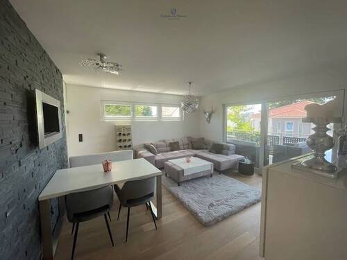 Wohnbereich mit Ethanolkamin - Etagenwohnung mit 117,00 m&sup2; in Saarbrücken / Am Homburg zum Kaufen