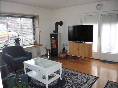 Wohnzimmer, Erdgeschoss - Einfamilienhaus mit 170,00 m² in Zeitlofs zum Kaufen
