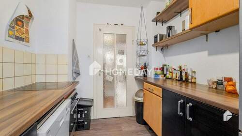 Küche 2 - Geräumige 3-Zimmer-Wohnung mit Balkon in der Innenstadt