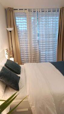 Schlafzimmer - 2 Zimmer Etagenwohnung in München