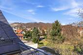 Blick Balkon - Etagenwohnung mit 82,10 m&sup2; in Radebeul zum Kaufen
