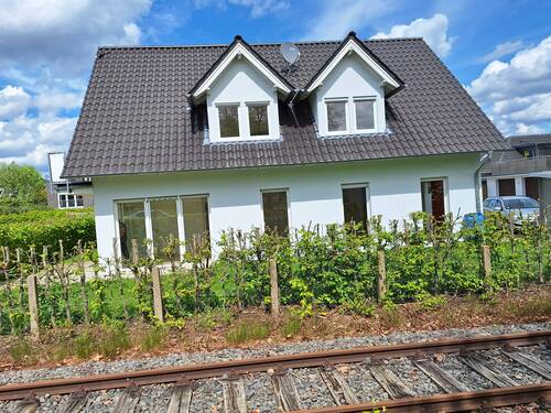 20240429_135854.jpg - Gut vermietet: Zweifamilienhaus in Sackgassenlage im Zentrum