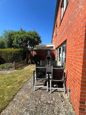 Terrassse mit Kamin.JPEG - Reihenendhaus mit 126,00 m&sup2; in Norderstedt zum Kaufen