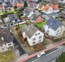 Bebautes Grundstück mit genehmigter Planung für ein Sechsparteienhaus mit geförderten Wohnungen in Gütersloh-City!