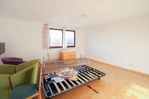 Wohnzimmer - 4 Zimmer Einfamilienhaus zum Kaufen in Dörphof