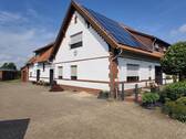 Ansicht Süd-West mit Hof - 1 Zimmer Einfamilienhaus in Wagenfeld