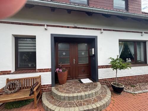 Ansicht Süden mit Eingangsbereich - Einfamilienhaus mit 220,00 m&sup2; in Wagenfeld zum Kaufen
