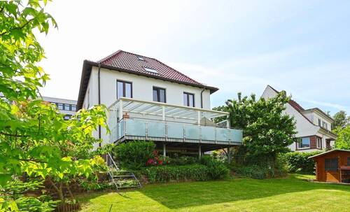 Blick aus dem Garten - Einfamilienhaus mit 140,00 m&sup2; in Lübbecke zum Kaufen