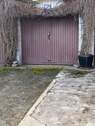 Garage mit Stellplatz davor - 