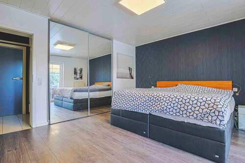 Schlafzimmer - Einfamilienhaus mit 142,00 m&sup2; in Biebertal zum Kaufen