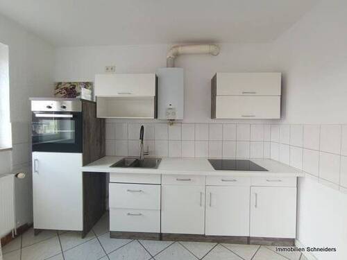 Küche mit Einbauzeile - Etagenwohnung mit 65,30 m² in Duisburg zur Miete