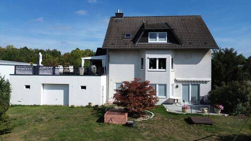 Bild 1 - Wohnen & Arbeiten - Zweifamilienhaus mit Gewerbefläche