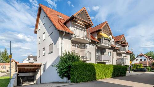 Außenansicht 1 - Hell, gepflegt, mit Balkon & Tiefgarage: Ihr neues Zuhause wartet auf Sie!