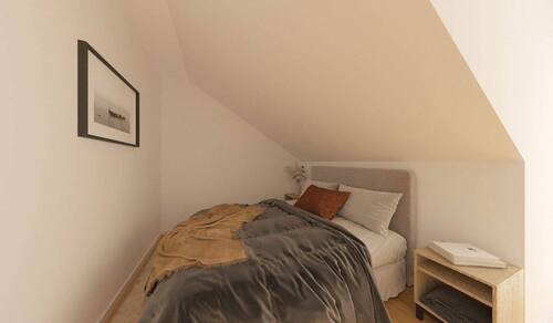 Ein gemütliches Schlafzimmer sorgt für beste Erhol - 