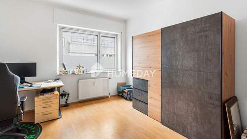 1. OG Schlafzimmer 1 - 