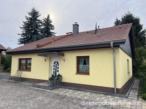 Hausansicht - Geschäftshaus und Einfamilienhaus mit Wintergarten in beliebter Wohnlage zu verkaufen