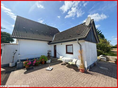 Ostansicht - Einfamilienhaus mit 89,40 m² in Nübel-Berend zum Kaufen