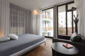 Schlafzimmer mit Ausgang zum Balkon - 