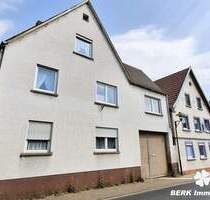 BERK Immobilien - Vielseitiges Zweifamilienhaus mit großem Potenzial in Mömlingen