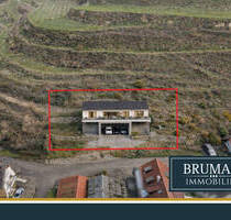 BRUMANI | Großzügiges Baugrundstück mit Genehmigung und Hanglage in Vogtsburg, auf ca. 1.000 m²
