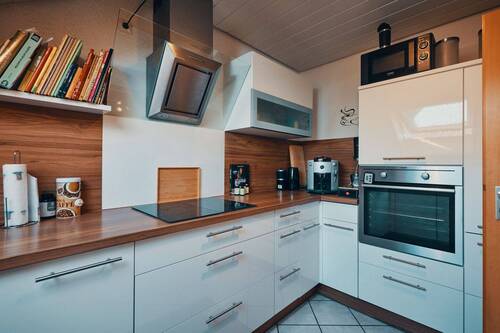 Küche mit Einbauküche - 