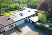 Bild 1 - Provisionsfrei! Modernisierter Flachdachbungalow mit großem Garten in Erftstadt-Friesheim