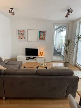 Wohnzimmer Schleusengraben 5.jpeg - Etagenwohnung mit 62,60 m&sup2; in Elmshorn zur Miete