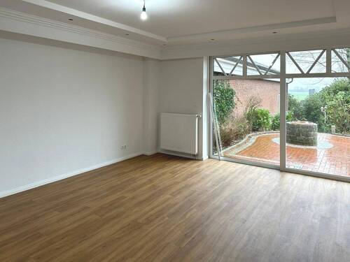 Wohnzimmer - Etagenwohnung mit 157,60 m² in Syke zum Kaufen