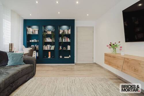 Wohnzimmer_HeA-1002 - Wohnen mit Mehrwert - Stilvolle 3,5-Zimmer-Wohnung mit Terrasse & TG-Stellplatz