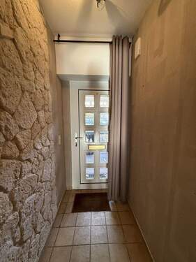 Flur im EG mit praktischem Windfang - 