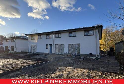 Modernes Zuhause - Neubau in Niendorf: Maisonette-ETW im Effizienzhaus 55 mit Terrasse und eigenem Garten