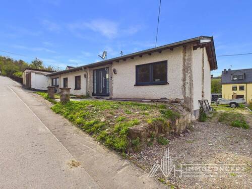 Vorder_Seitenansicht_rechts - 3 Zimmer Bungalow zum Kaufen in Maring-Noviand