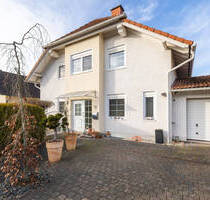 Einfamilienhaus mit Einliegerwohnung, Doppelgarage und Garten. Willkommen in Horhausen!