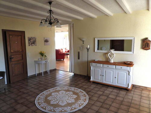 Wohnzimmer mit Specksteinofen - 