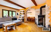 Wohnzimmer mit Kamin Haupthaus - 