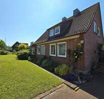 Gepflegtes Einfamilienhaus im Zentrum von Vögelsen mit Garage, Carport und schönem Garten